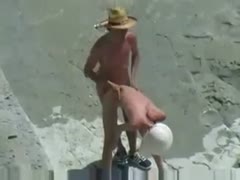 I saw an amateur couple having sex outside on the bank.